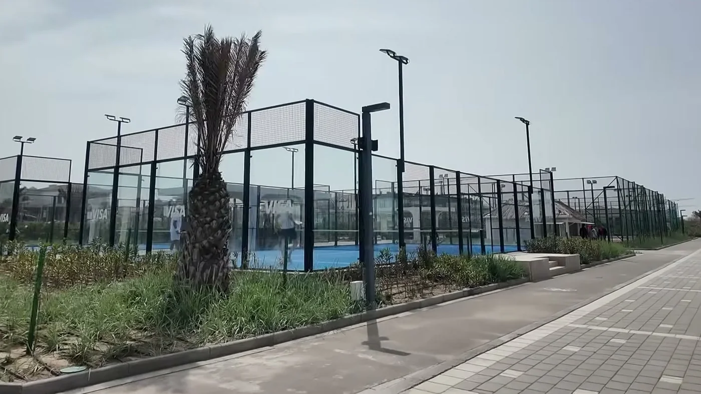 Padel courts along a resort path