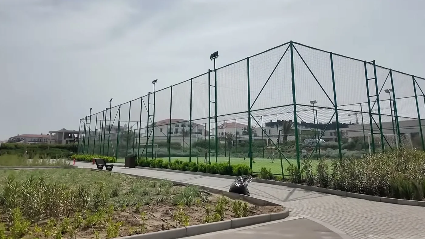 The football pitch by the promenade